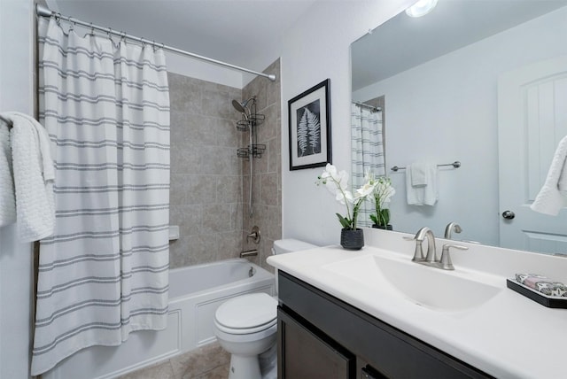 full bathroom featuring vanity, tile patterned flooring, toilet, and shower / tub combo