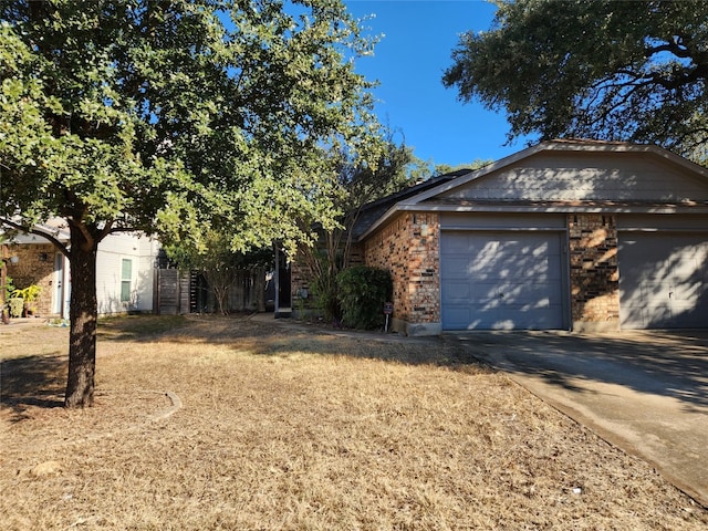 view of side of property featuring a garage