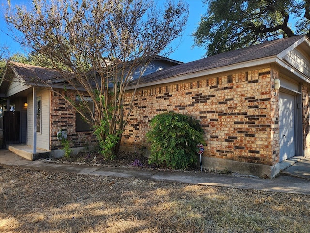 view of home's exterior with a garage