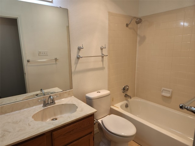 full bathroom with vanity, toilet, and tiled shower / bath