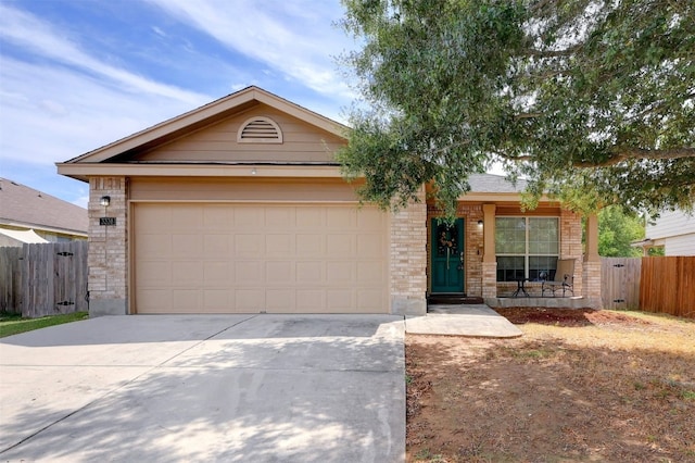 ranch-style house featuring a garage