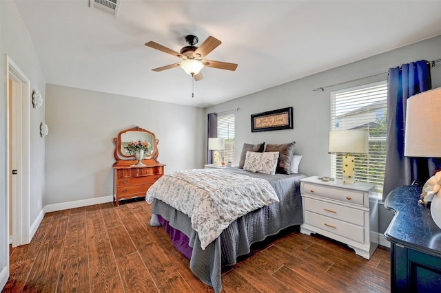 bedroom featuring ceiling fan and dark hardwood / wood-style floors