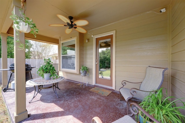 view of patio featuring a grill and ceiling fan