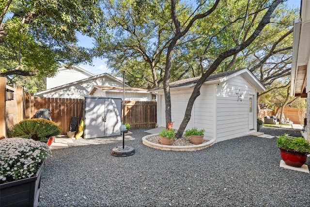 exterior space with a patio and a storage unit