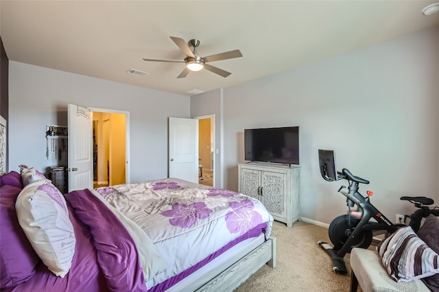 bedroom featuring light carpet and ceiling fan