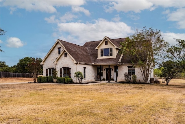 view of front facade with a front lawn