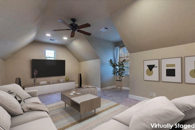 carpeted living room featuring ceiling fan and vaulted ceiling