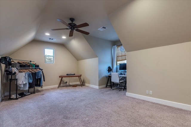 office space featuring ceiling fan, lofted ceiling, and light carpet