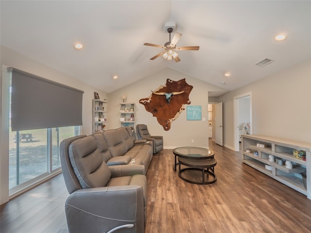 living room featuring ceiling fan, vaulted ceiling, and hardwood / wood-style floors