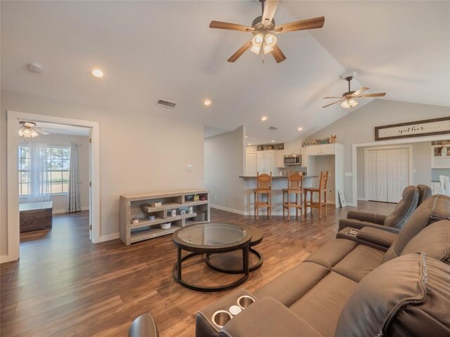 406 Blume Ln, Ledbetter, TX 78946 - living area featuring ceiling fan, lofted ceiling, baseboards, dark wood finished floors, and recessed lighting