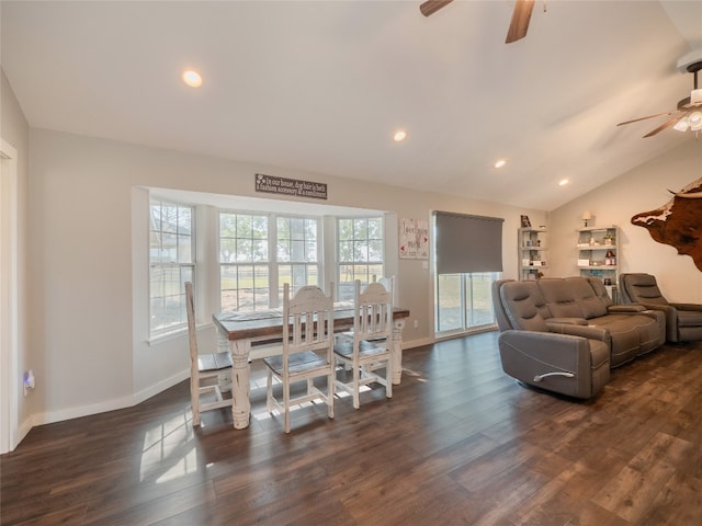 dining area featuring lofted ceiling, ceiling fan, and dark hardwood / wood-style flooring