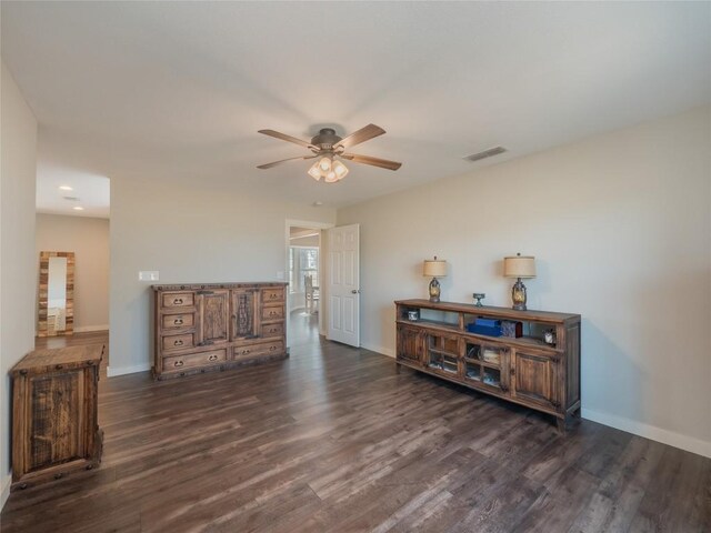 406 Blume Ln, Ledbetter, TX 78946 - empty room featuring a ceiling fan, baseboards, dark wood finished floors, and recessed lighting