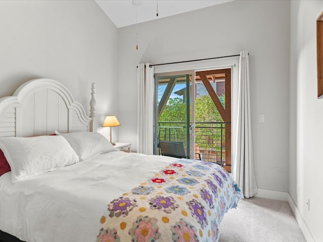 bedroom with carpet, vaulted ceiling, and access to exterior