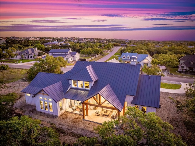 view of aerial view at dusk