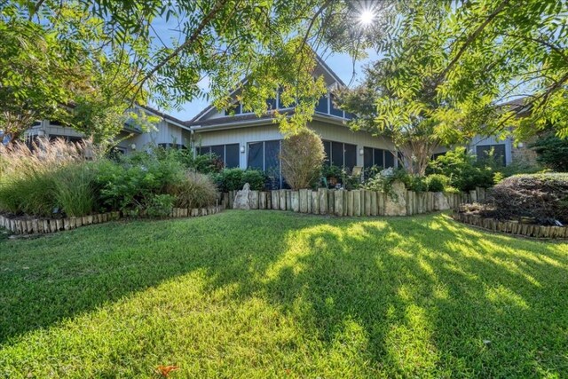 100 Silver Spur, Horseshoe Bay, TX 78657 - view of side of home featuring a yard