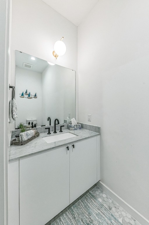 bathroom featuring vanity and tile patterned floors