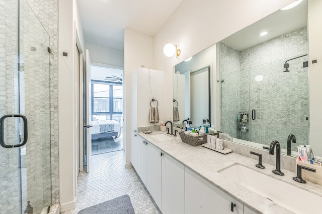 bathroom with vanity, tile patterned floors, and an enclosed shower