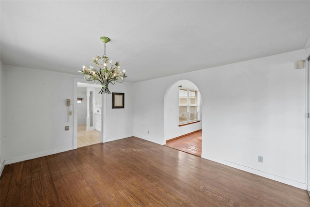 spare room featuring hardwood / wood-style flooring