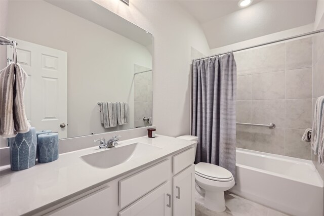 full bathroom with vaulted ceiling, vanity, shower / tub combo, and toilet