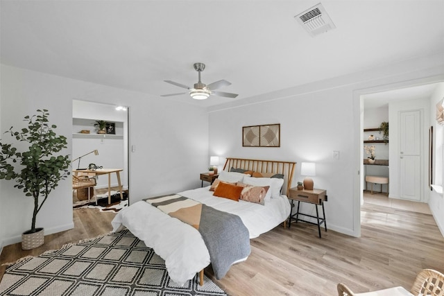 bedroom featuring ceiling fan and light wood-type flooring