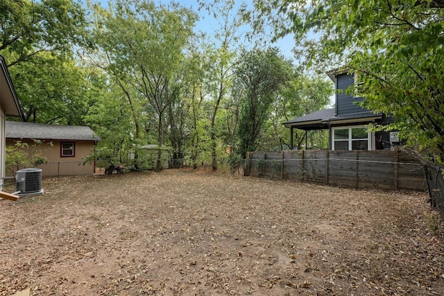 view of yard with central AC unit