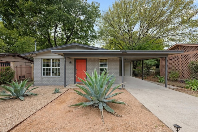 ranch-style house with a carport