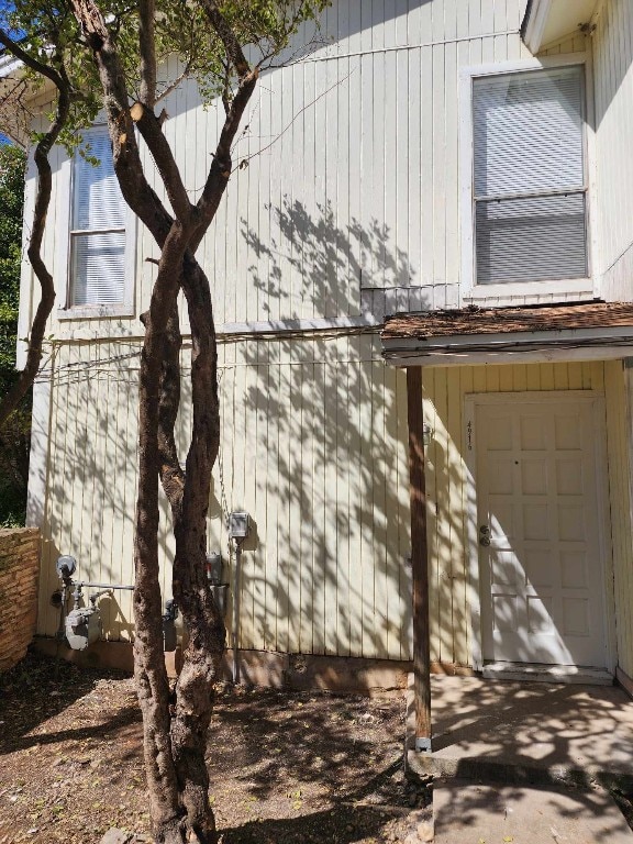 view of property exterior with a garage