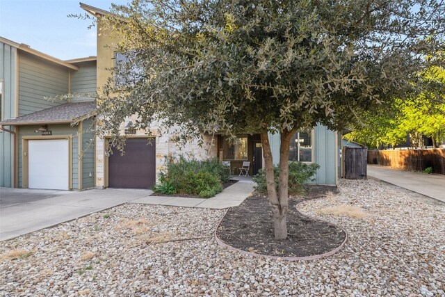 view of front of property with a garage