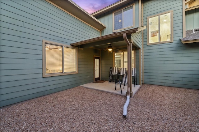 4408 Banister Ln Unit B, Austin, TX 78745 - doorway to property featuring board and batten siding and a patio