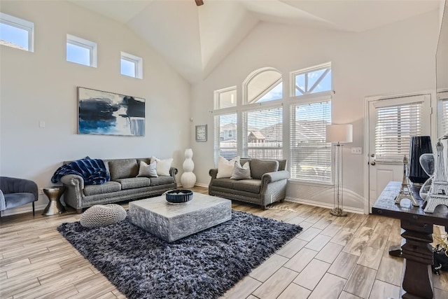 living room with a towering ceiling