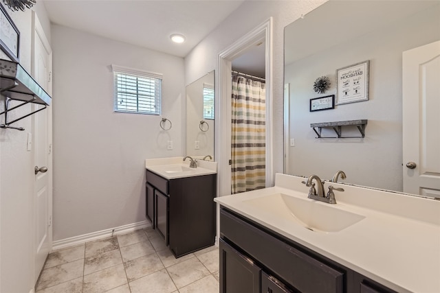 bathroom featuring tile patterned floors and vanity