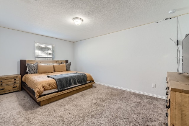 carpeted bedroom with a textured ceiling