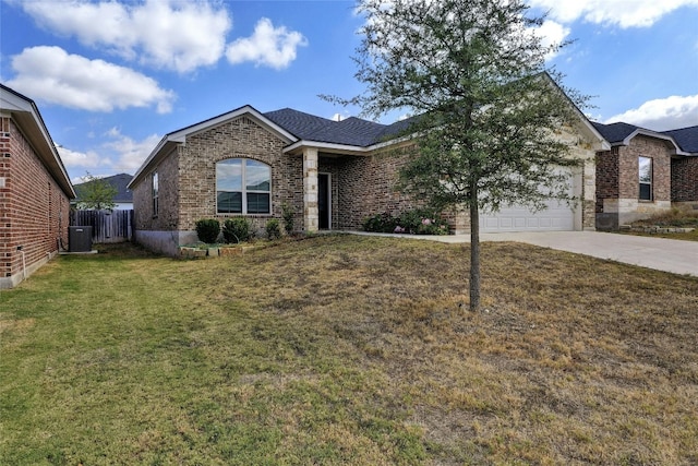 view of front of property featuring a garage, a front lawn, and central air condition unit