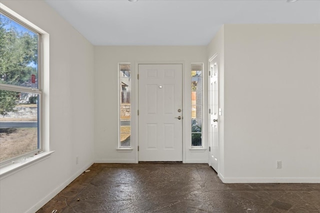 foyer with plenty of natural light