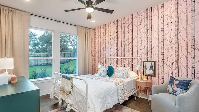 bedroom with baseboards, a ceiling fan, recessed lighting, and wood finished floors