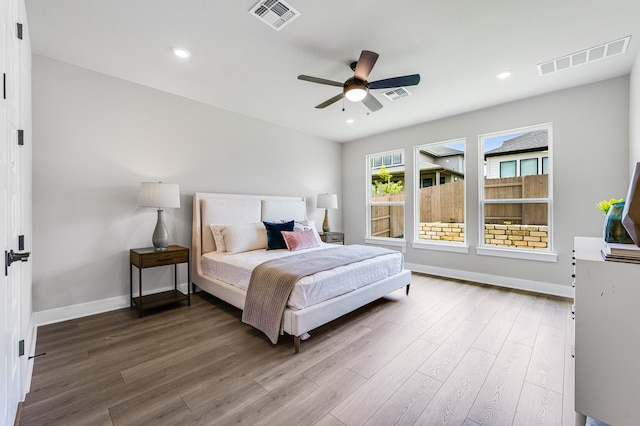 9213 Flatbush Dr, Austin, TX 78744 - bedroom with wood finished floors, baseboards, recessed lighting, and ceiling fan