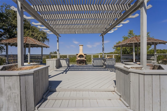 deck featuring a gazebo and a pergola