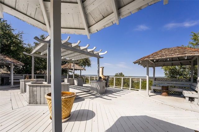 wooden terrace with a pergola