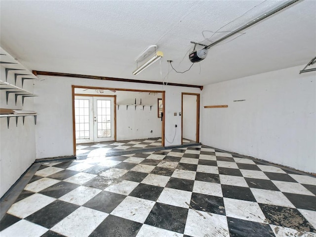 21401 Patton Ave Unit A & B, Lago Vista, TX 78645 - garage featuring french doors and a garage door opener