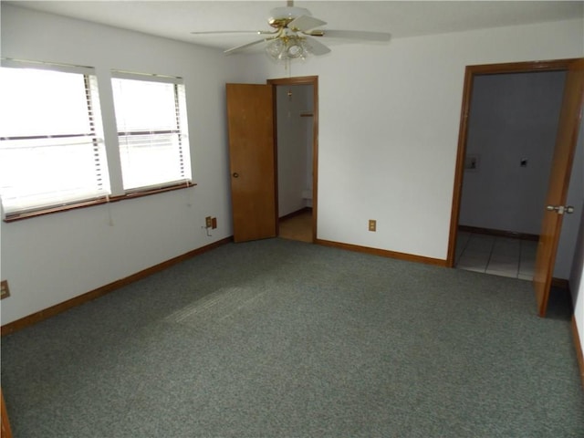 21401 Patton Ave Unit A & B, Lago Vista, TX 78645 - unfurnished room featuring carpet, a ceiling fan, and baseboards