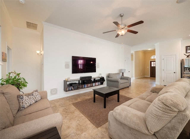 tiled living room with ornamental molding and ceiling fan