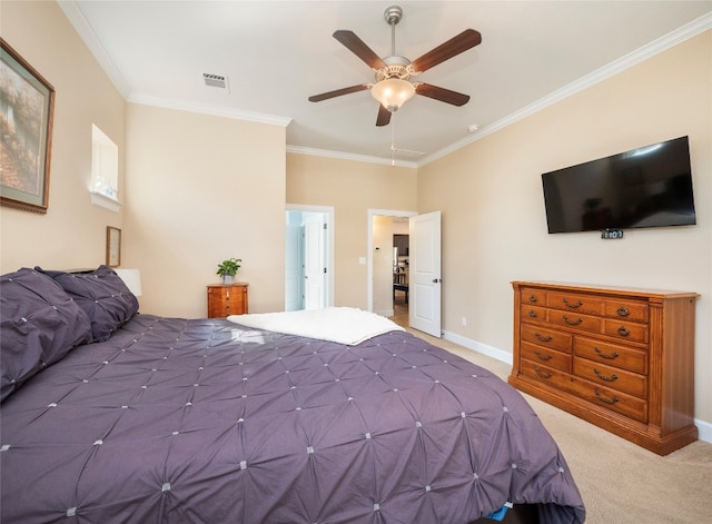 bedroom featuring ceiling fan, crown molding, and carpet floors