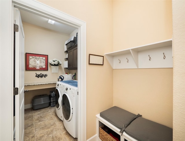 laundry area with cabinets and independent washer and dryer