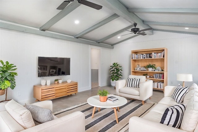 living room with concrete floors, lofted ceiling with beams, and ceiling fan