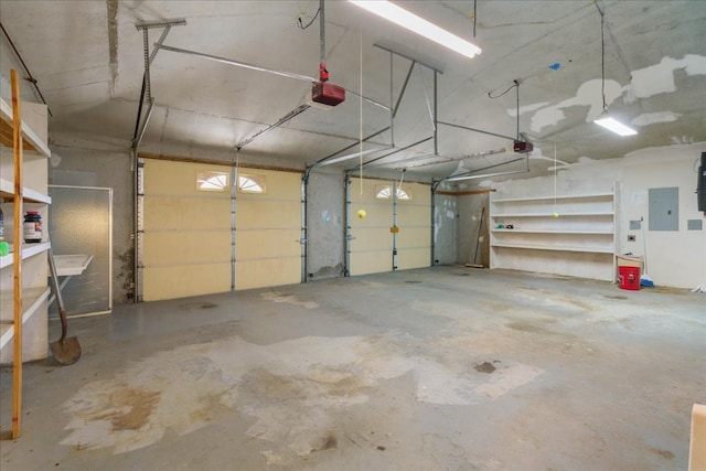 garage featuring electric panel and a garage door opener