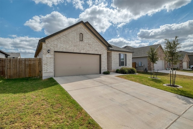 view of front of property featuring a garage, brick siding, fence, driveway, and a front lawn