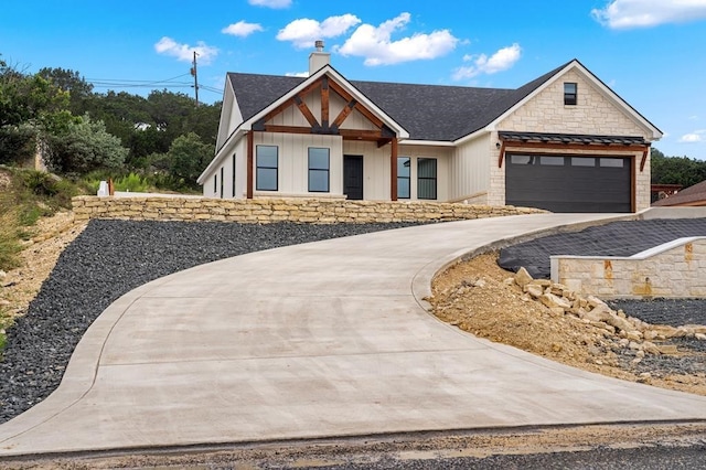 view of front of property with a garage