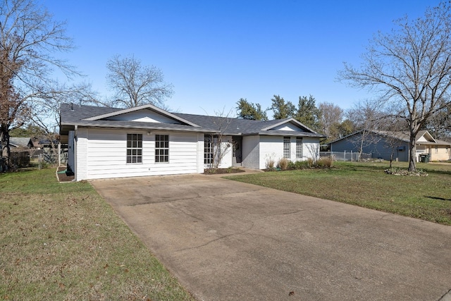 single story home with a front yard