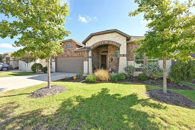 view of front of house with a front lawn and a garage