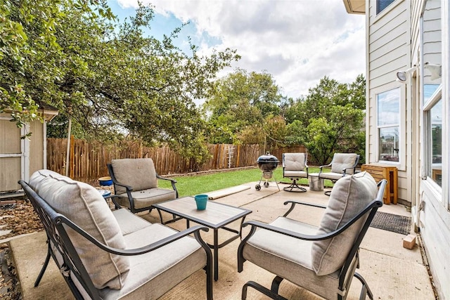 view of patio with a fenced backyard and an outdoor hangout area